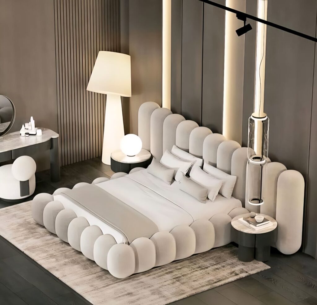 Modern bedroom with bold tufted bed and vertical headboard showcasing 2025 headboard design trends in monochrome tones.