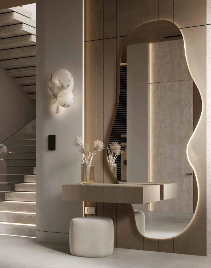 The wall-mounted console saves space. The mirror-free mirror complements the modern console table ideas.