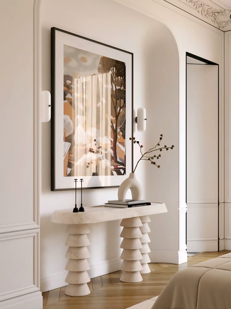 Modern Console Table Ideas with a light-colored look and sculptural legs.
